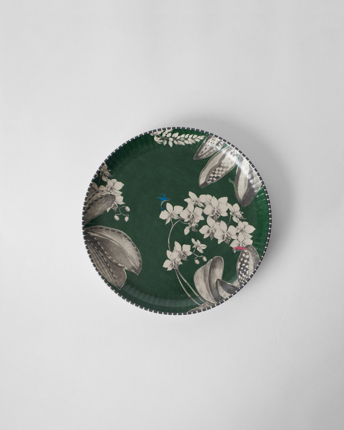 Reesha Quarter Plate - Green with a white flower print on a dark green base.