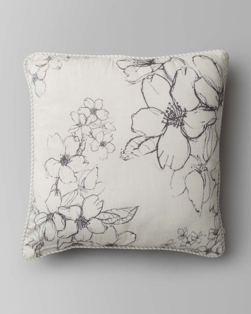 Sakura Cushion Cover with grey line-drawn blossoms on a cream background.