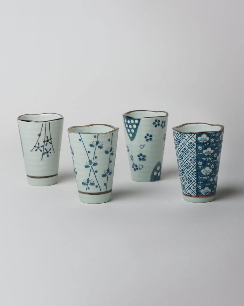 Set of four Aiiro Kulhar cups in different blue and white patterns.