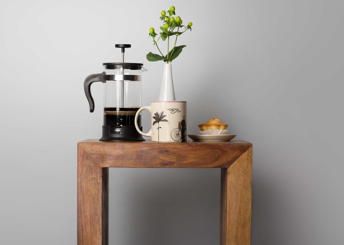 Misaki Mug on a wooden side table beside a French press.