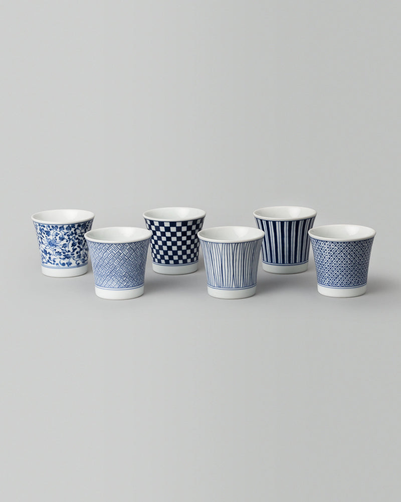 Set of six Sencha tea cups in different blue and white patterns.