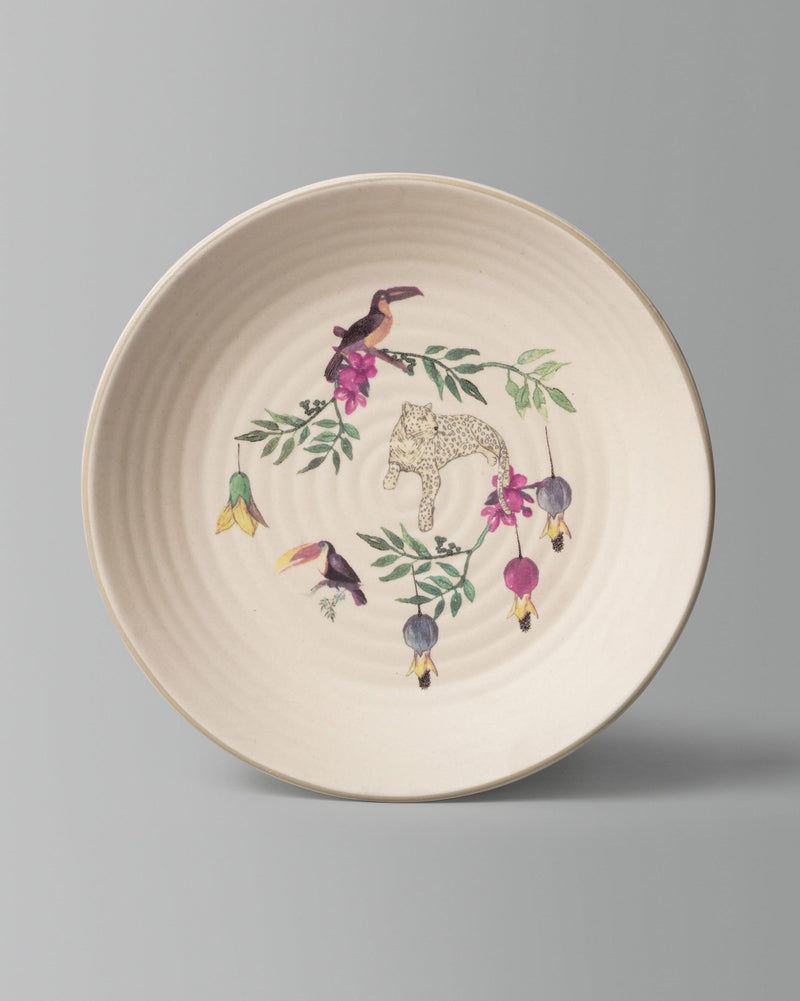 Nakano Pasta Plate with a leopard, toucans and bell flowers in its centre.