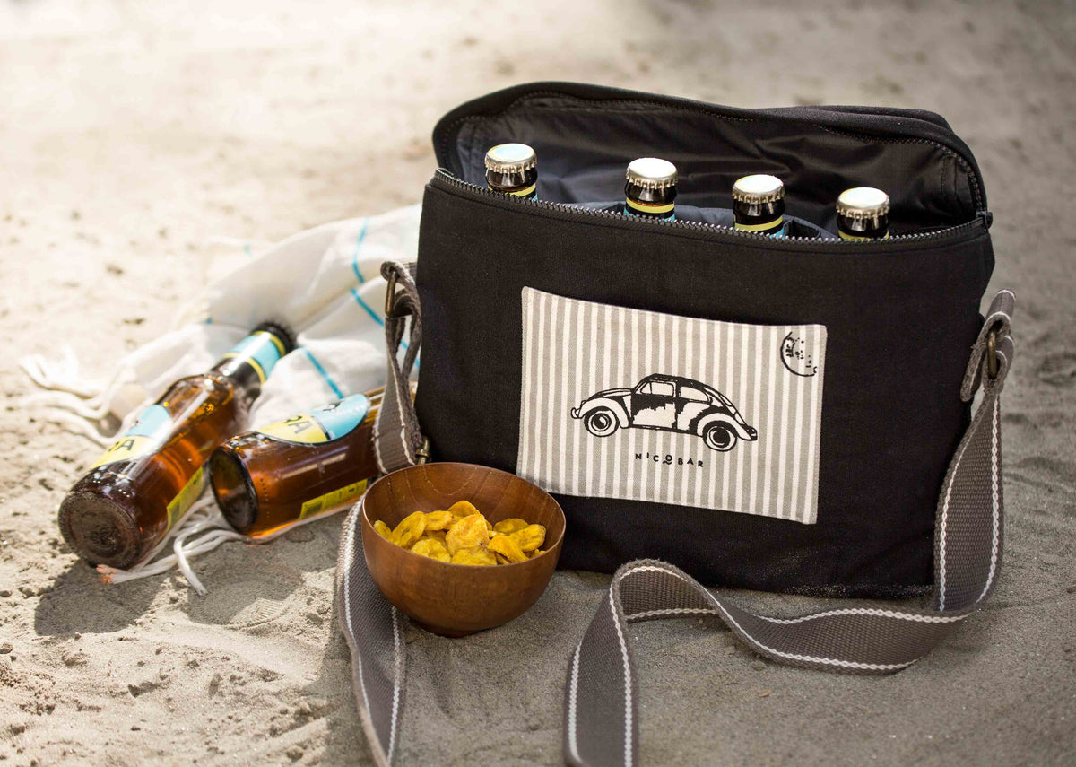 Open the Munchies & Byob Bag with bottles in its top section.
