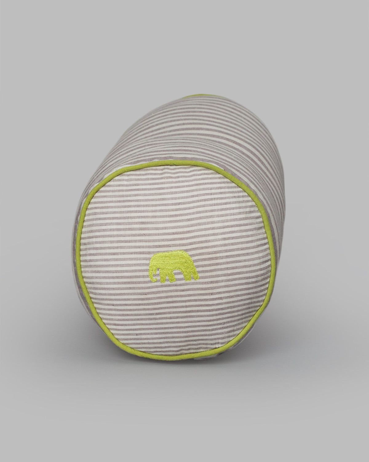 Close-up of Alleppey Stripes Bolster Cover end, showing a small green elephant.