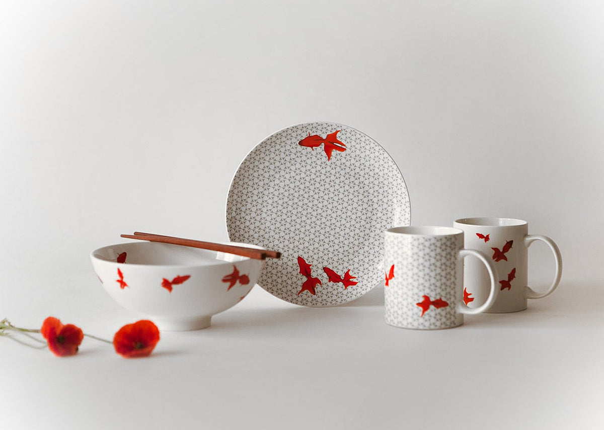 Guppy Shup Noodle Bowl set with a plate, mugs and chopsticks.