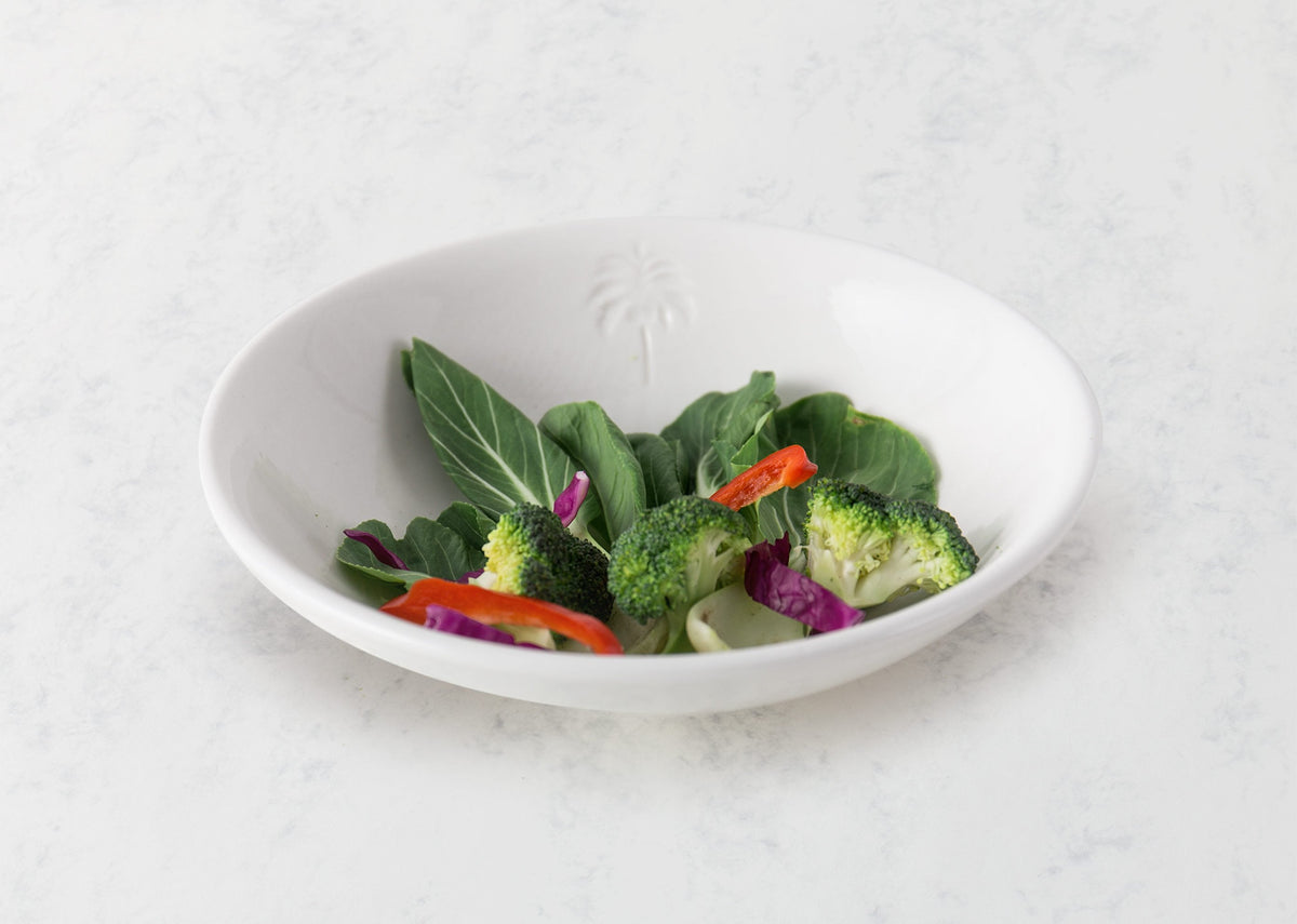 Malabar Vegetable Serving Dish filled with broccoli and leafy greens.