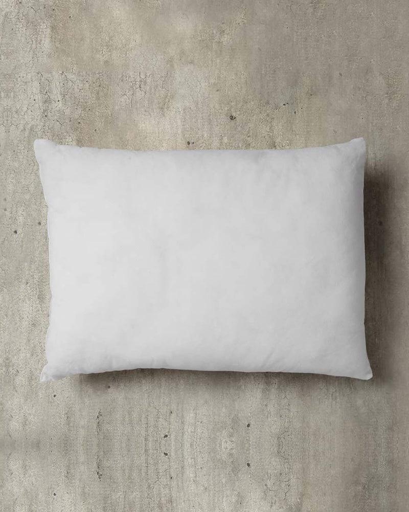 Overhead view of a white Pillow Filler 36 x 51 cm.
