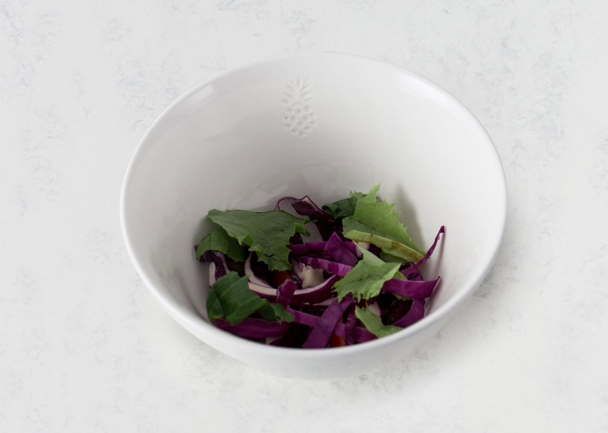 Malabar Curry Bowl Large filled with greens and shredded red cabbage.