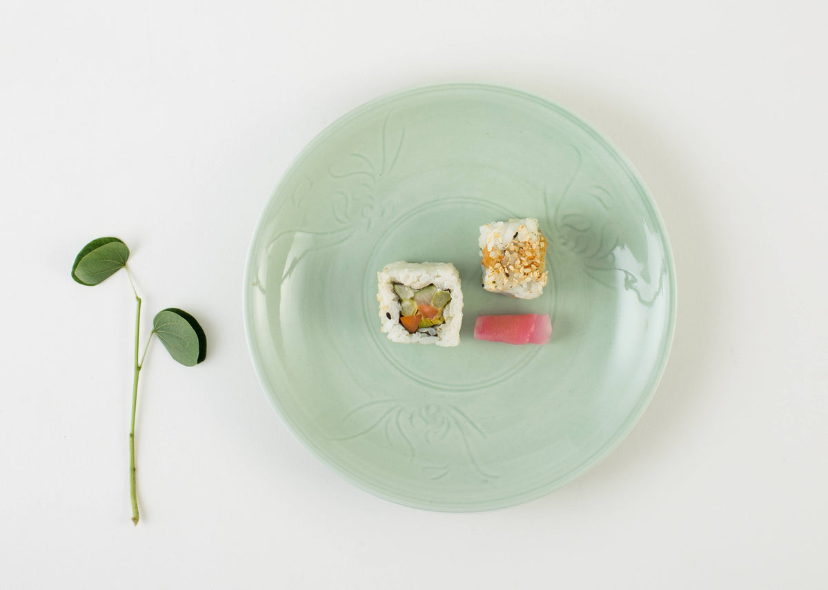 Overhead view of Celadon Salad Plate with food served on it.