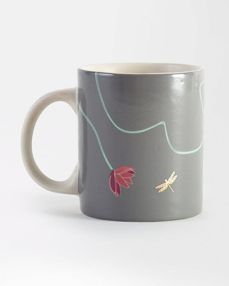 Lily Pond Mug with a grey body, a red lotus and a gold dragonfly.