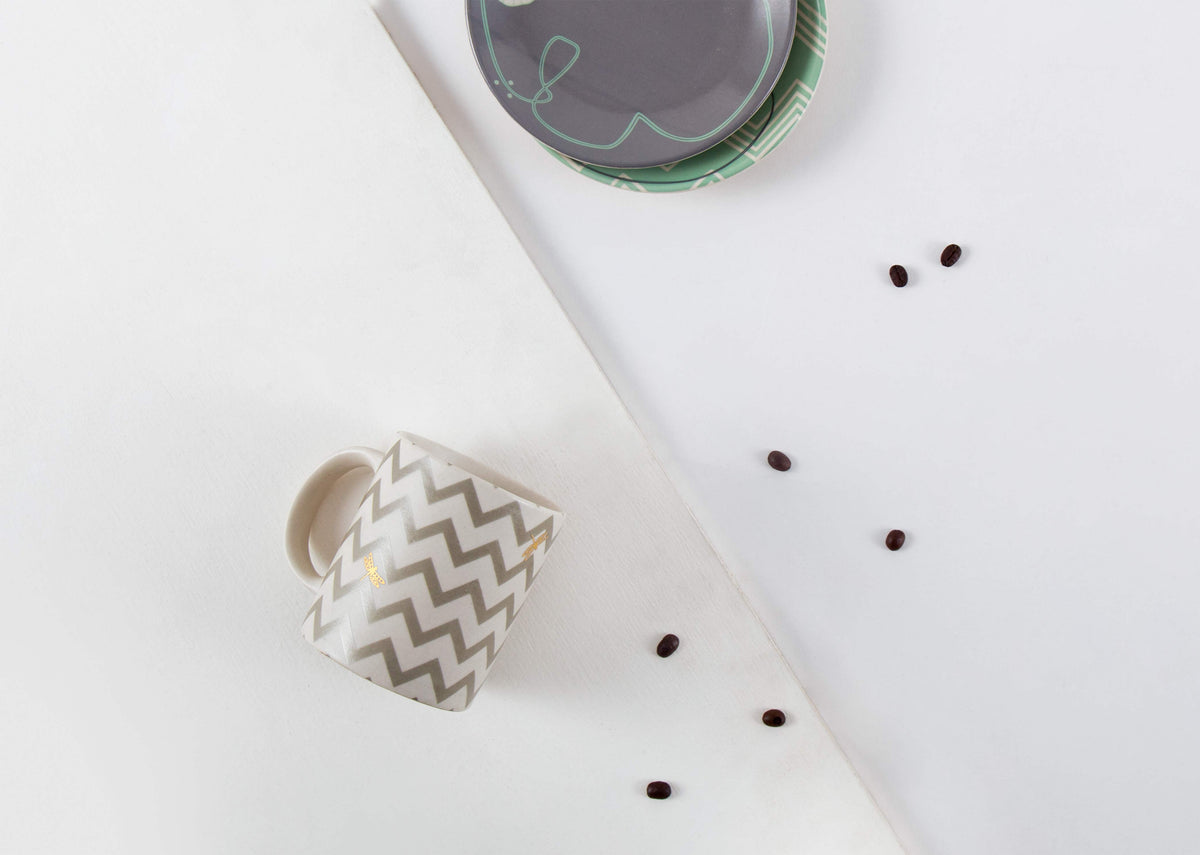 Lily Pond Chevron Mug seen from above on a white surface.