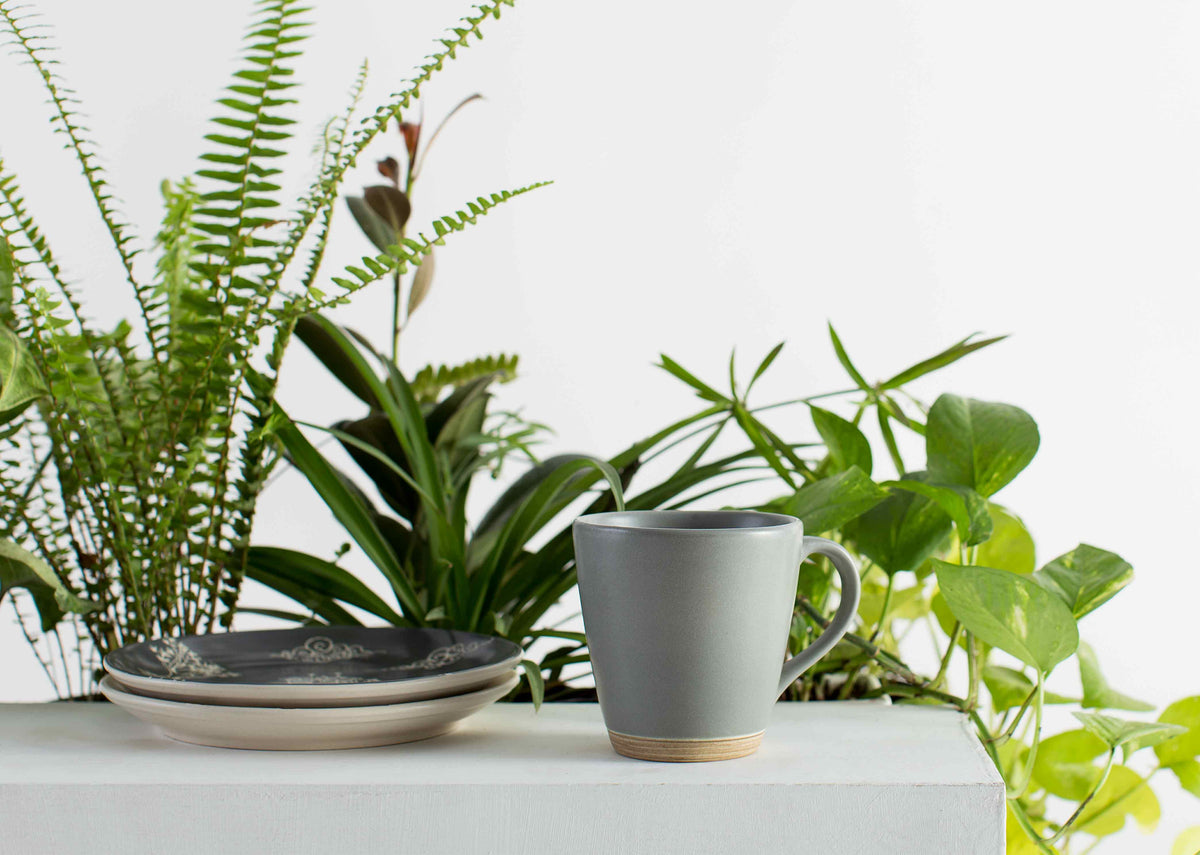 Basalt Mug in matte grey, standing upright.