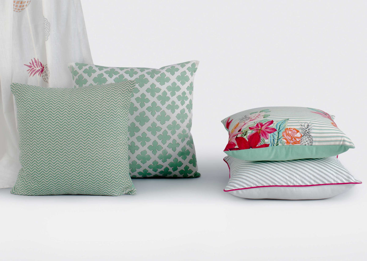 Mahe Chevron Cushion Cover in a row of green cushions.
