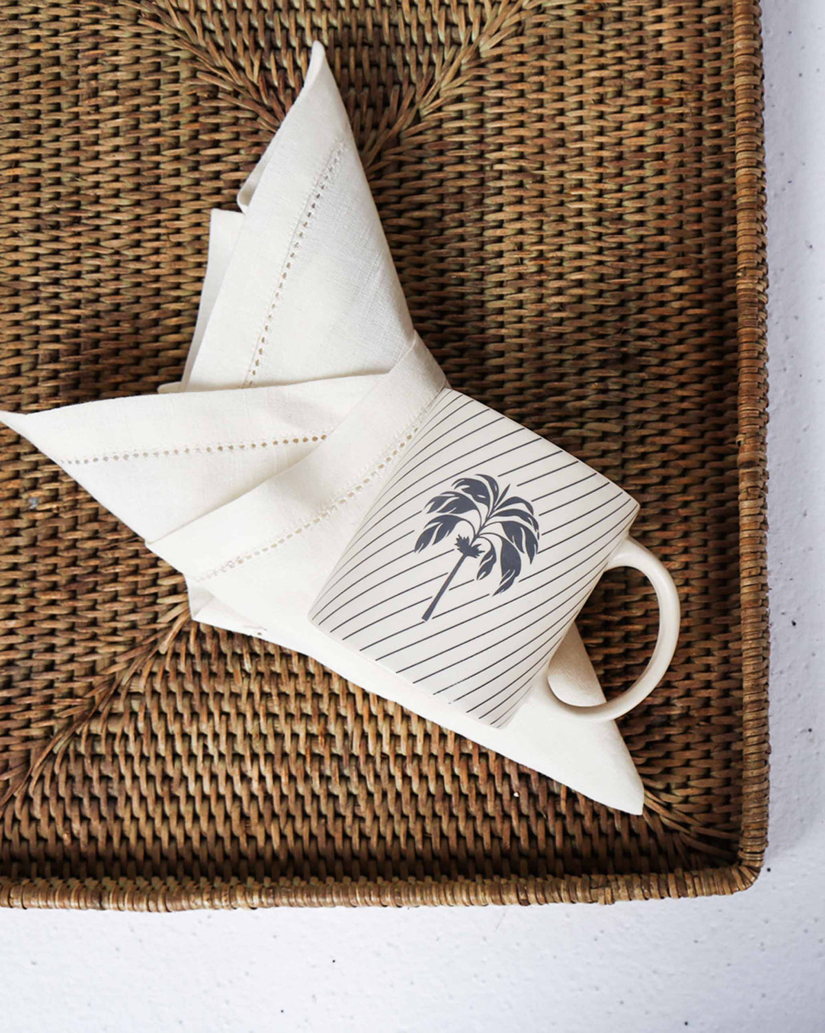 Palm Mug with a charcoal palm tree, shown from above.