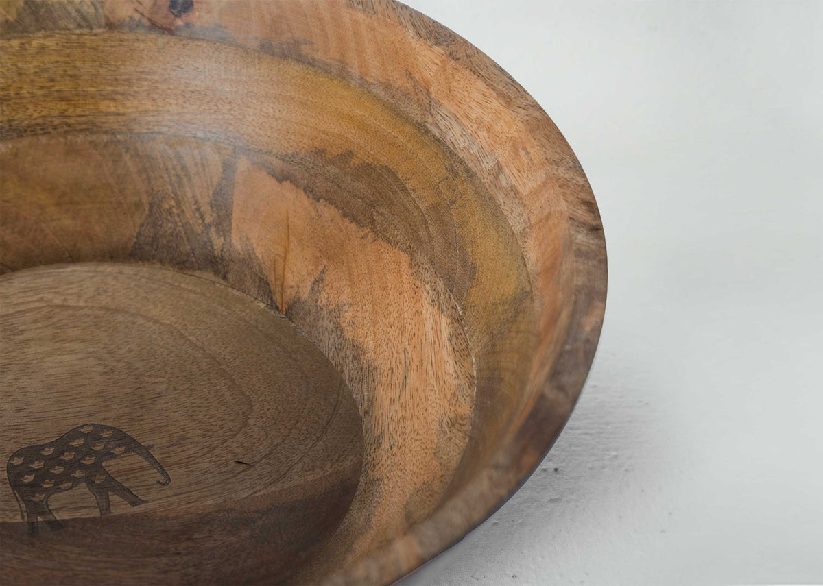 Close-up of Ele Salad Bowl showing an elephant motif on its inner base.