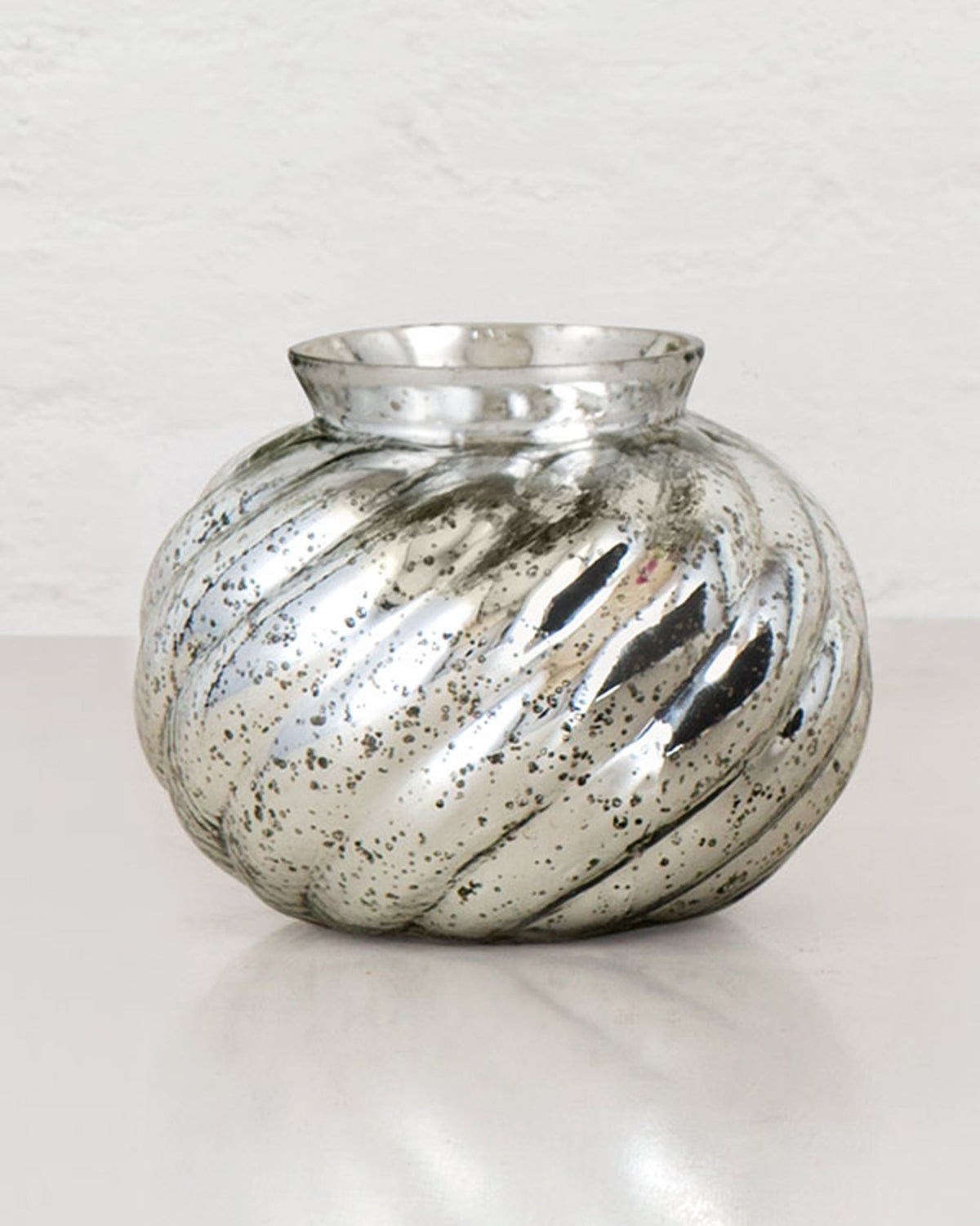 Andromeda Lota Vase in swirled speckled silver glass, shown empty.