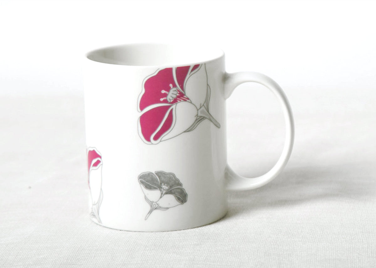 Side view of Frangi Flower Mug with fuchsia blooms and grey leaves.