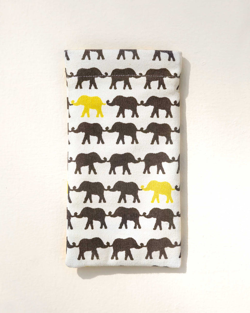 Haathi Spectacle Case laid flat, showing its brown and yellow elephant print.