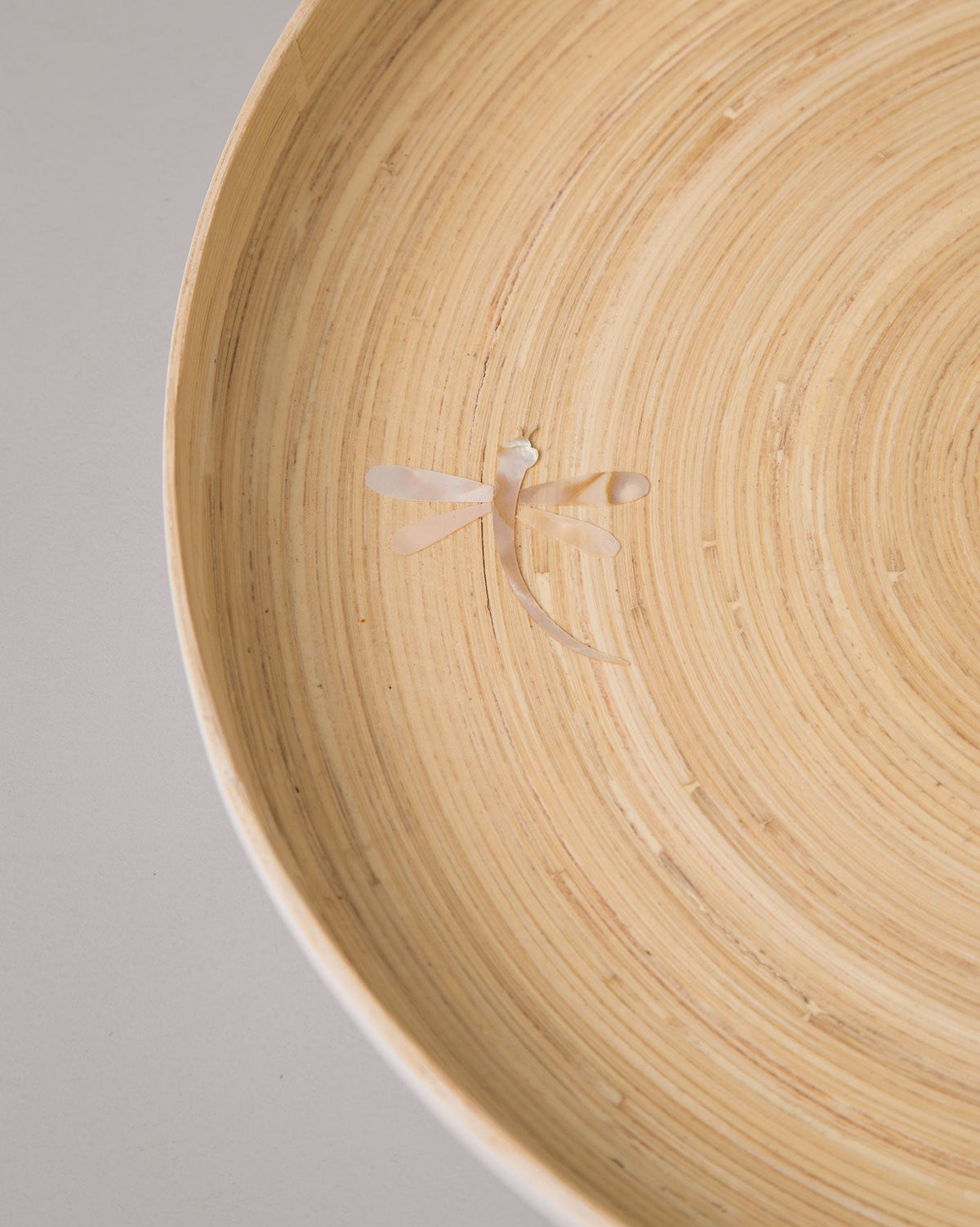 Close-up of the Bamboo Chip & Dip Platter interior showing a small pale inlay.