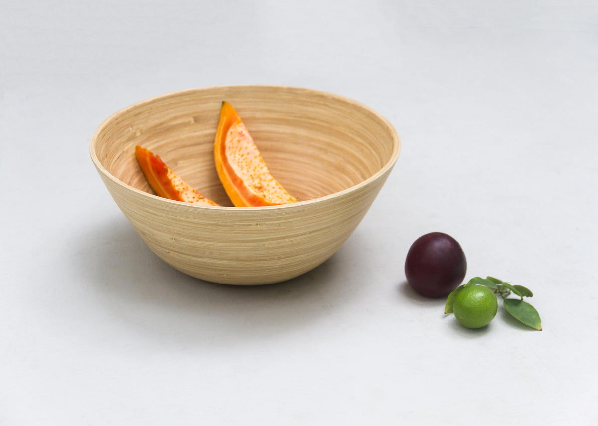Three-quarter view of the Bamboo Salad Bowl in natural bamboo.