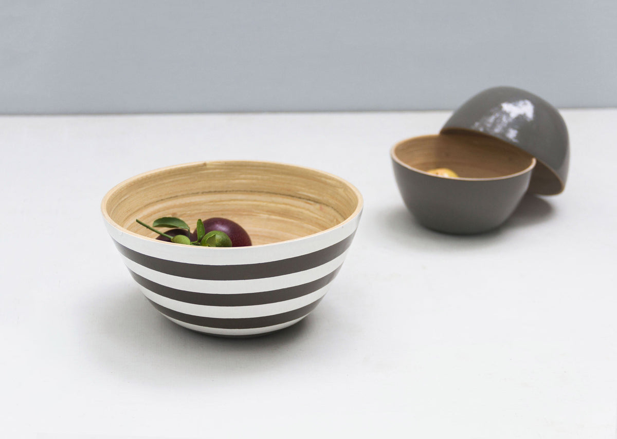 Bamboo Soup & Noodle Bowl with black and white stripes on a white surface.