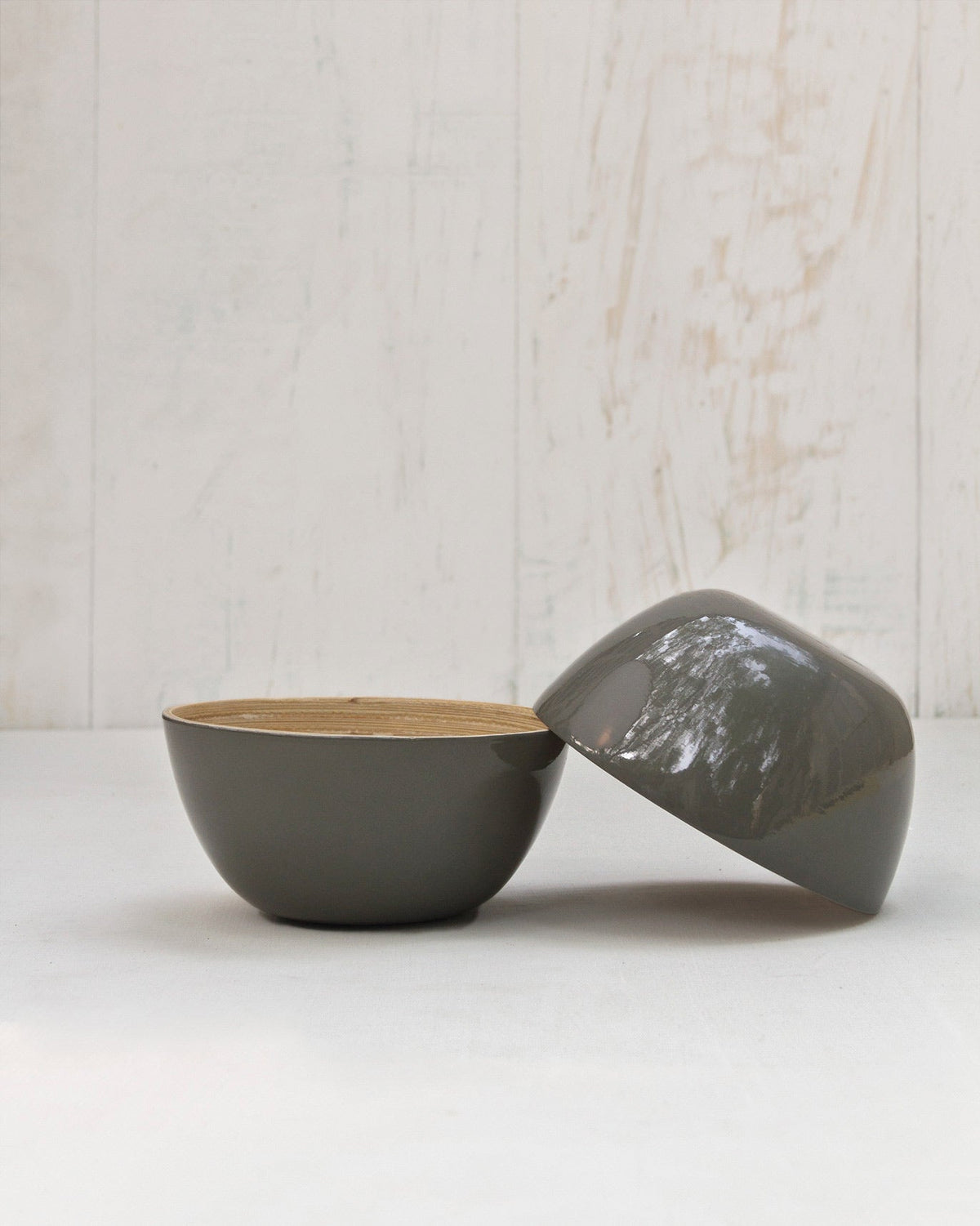 Bamboo Nut Bowl beside a second bowl turned upside down.