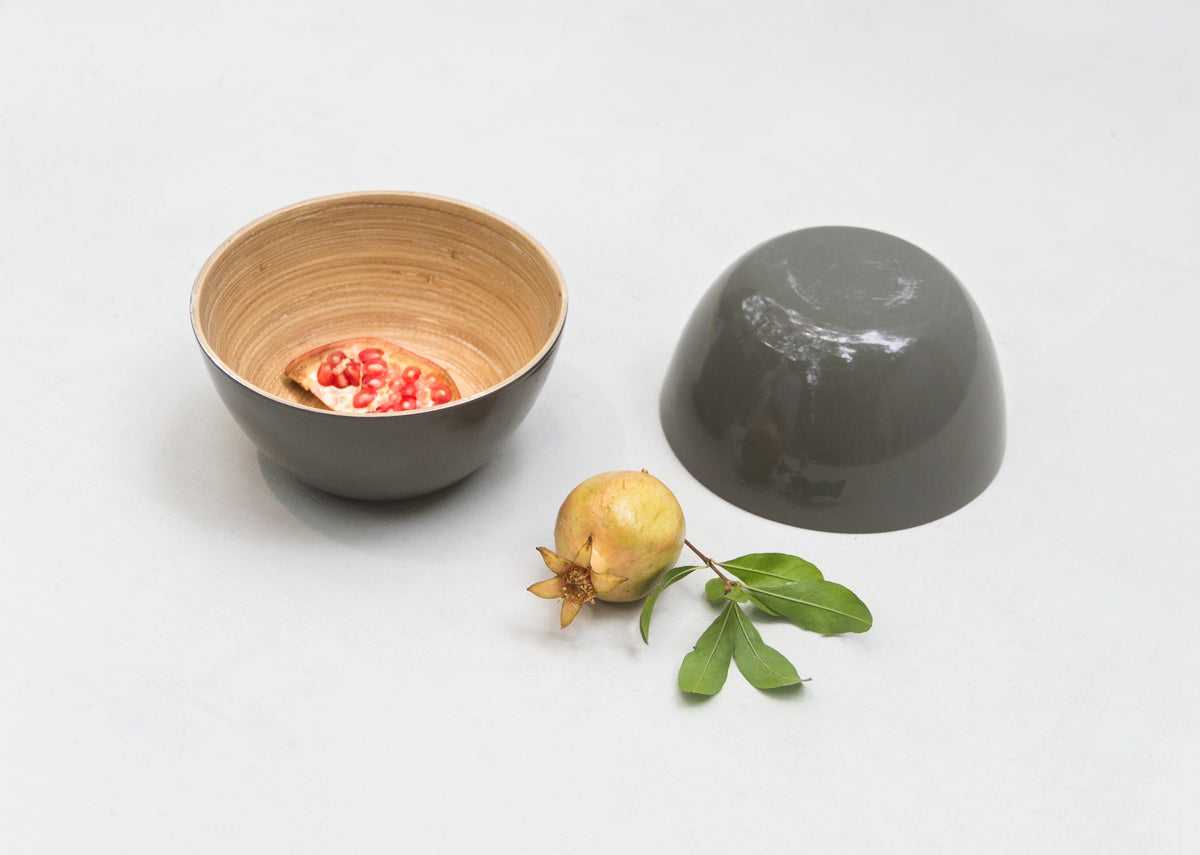 Bamboo Nut Bowl with a second bowl inverted beside it on a white surface.