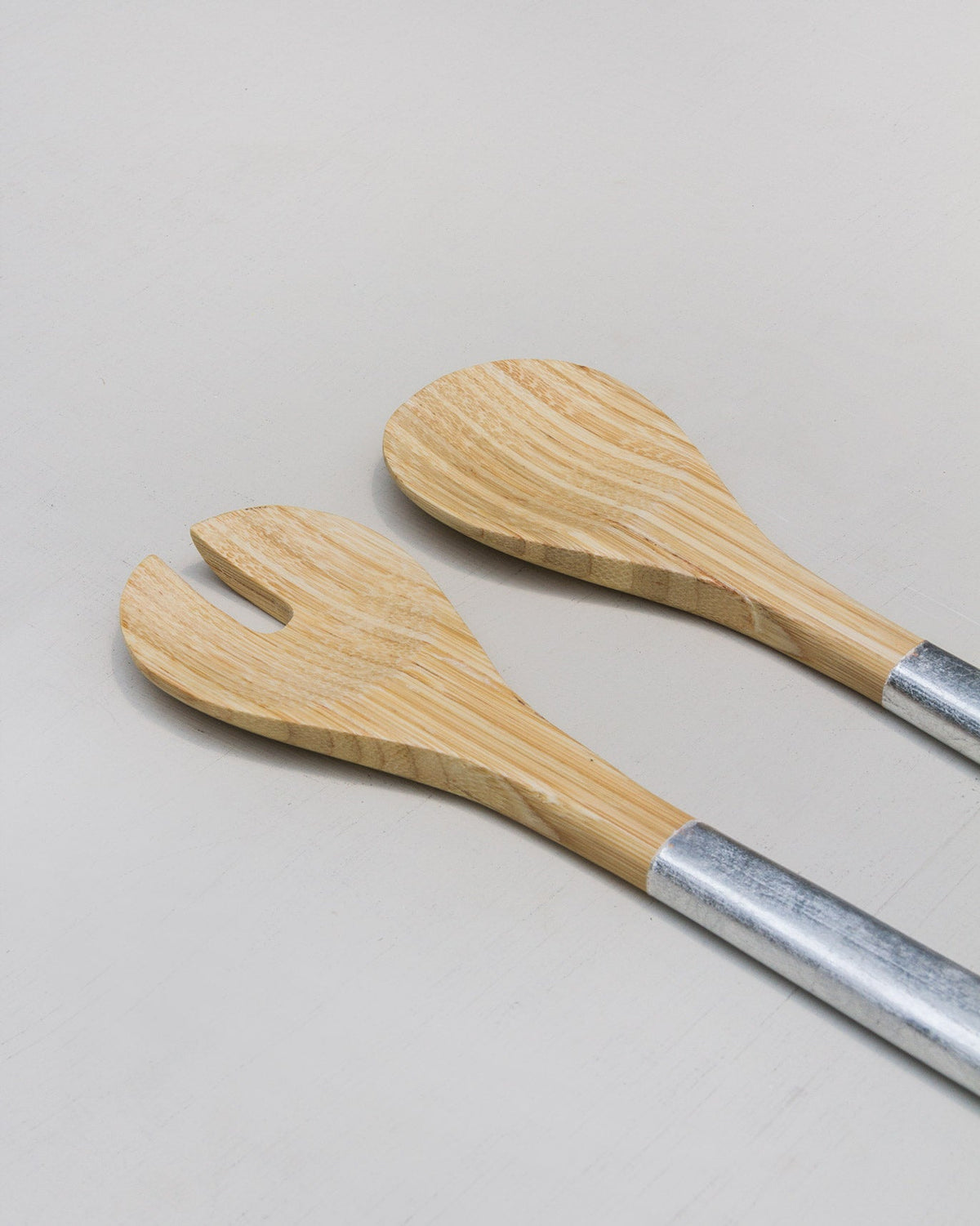 Close-up of the Bamboo Spoons showing silver-finished handles.