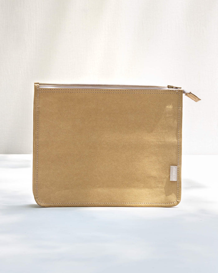 Brown Paper Pouch with a zip along the top edge.