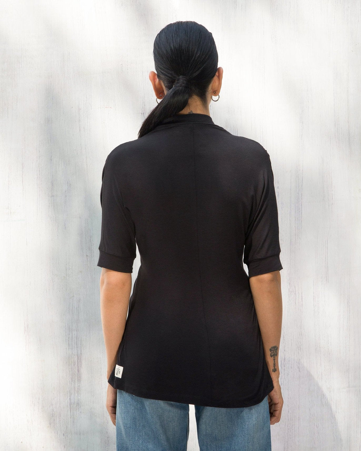 Back of Gathered Jersey Top worn by a person.