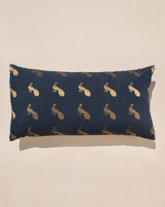 Peacock Lumbar Cushion Cover in navy with gold peacock motifs.