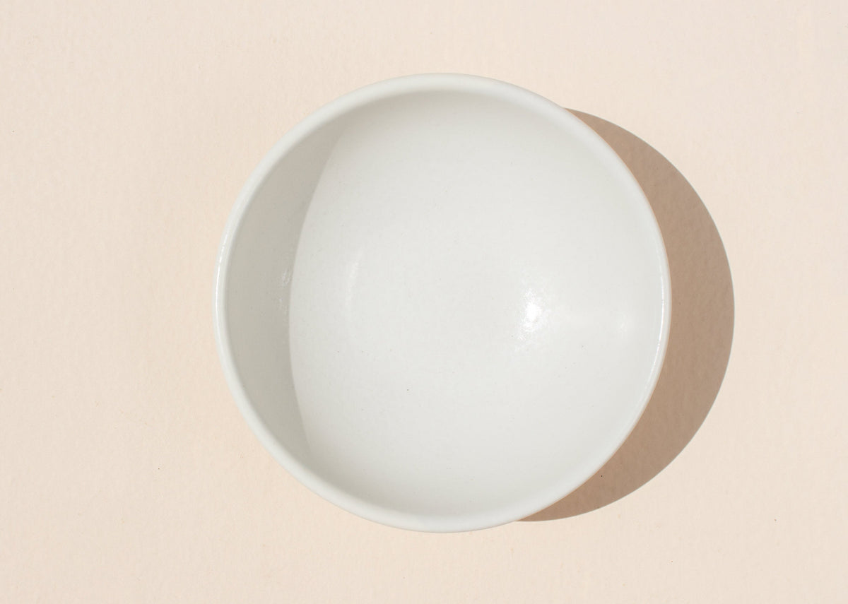 Overhead view of a Desert Dawn Katori in ivory.