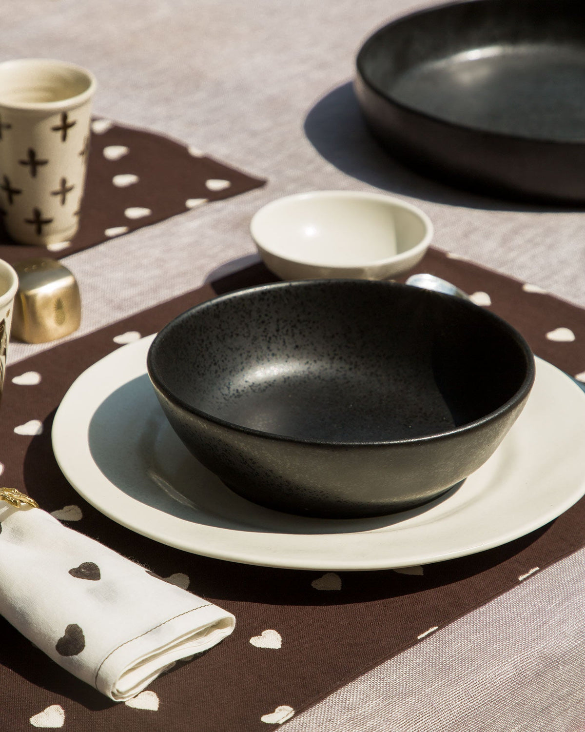 Desert Dusk Pasta Plate in black set on a white plate.