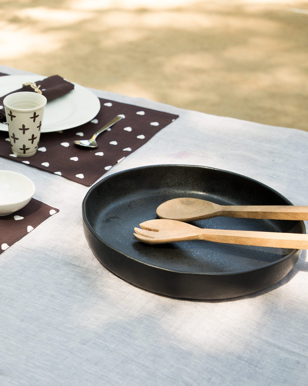 Desert Dusk Serving Dish in black on a table.