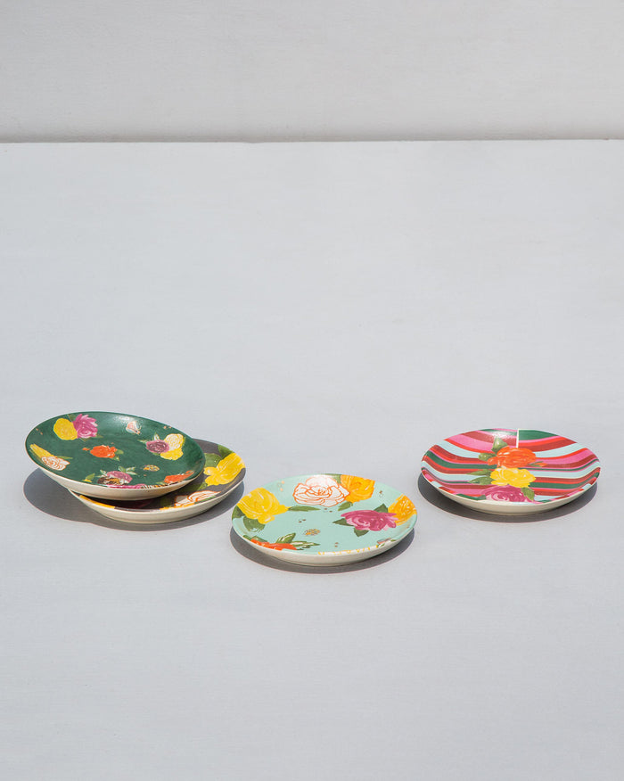 Four Serai Tea Plates in green, mint and striped prints.