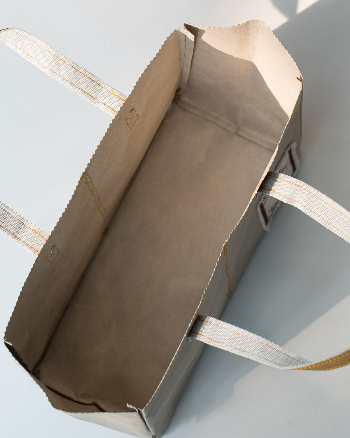 Inside of Jawai Paper Tote showing its paper lining.