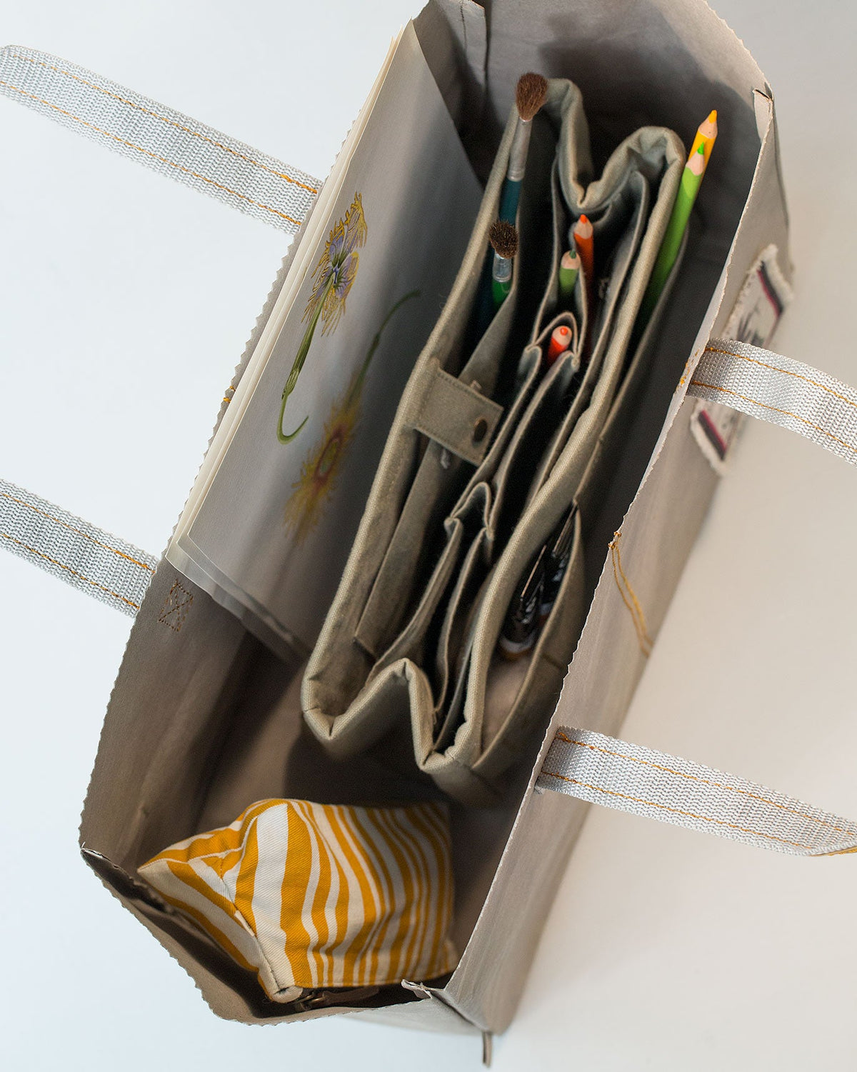 Open Jawai Paper Tote showing its inner organiser pouch.