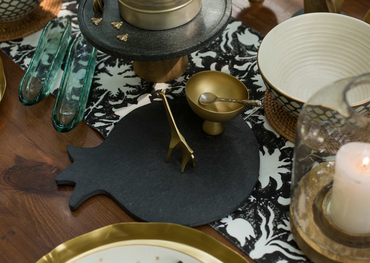 Anar Slate Cheese Platter in black slate on a dark table setting.