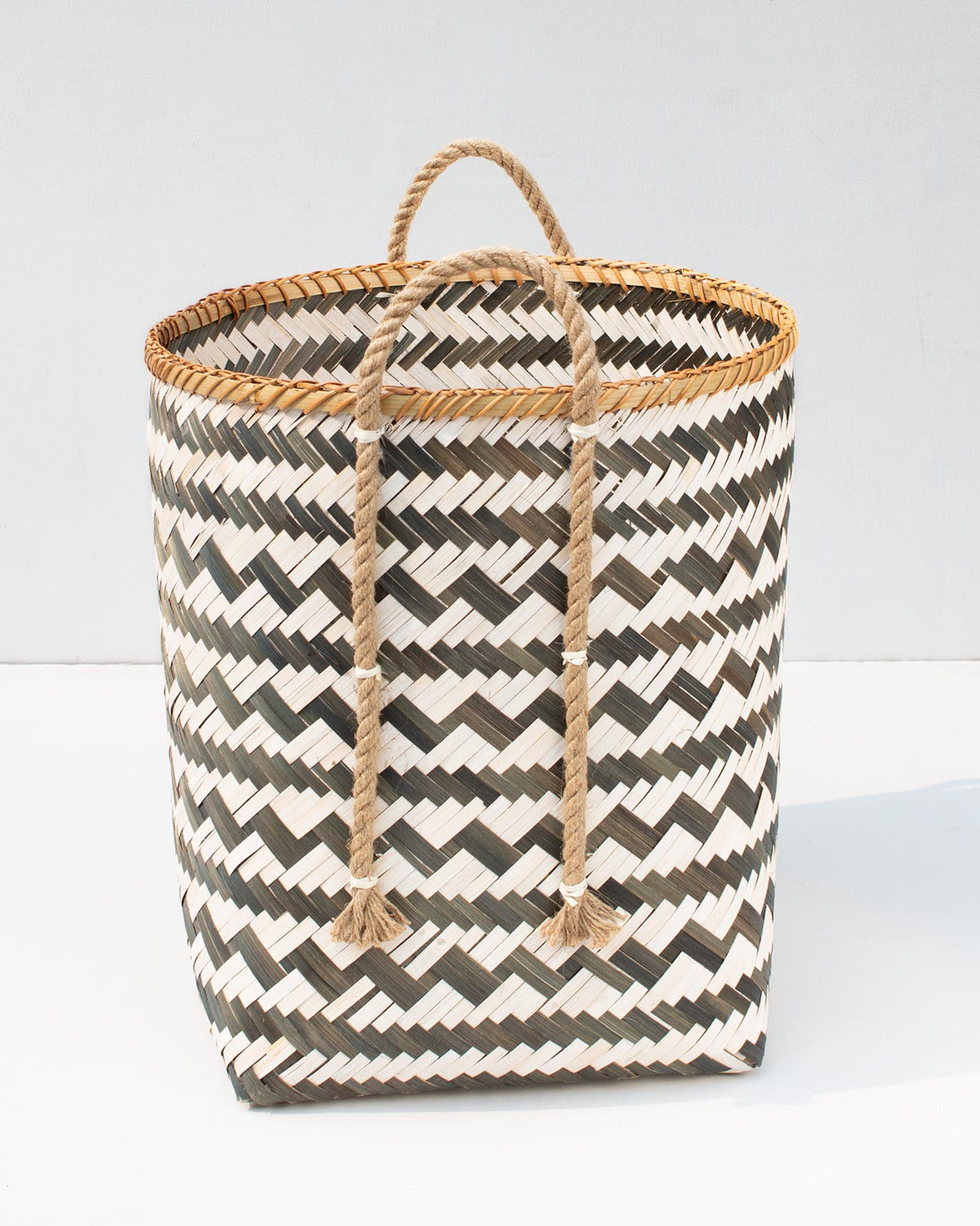 Large Bamboo Storage with a chevron weave and a rope handle across the top.