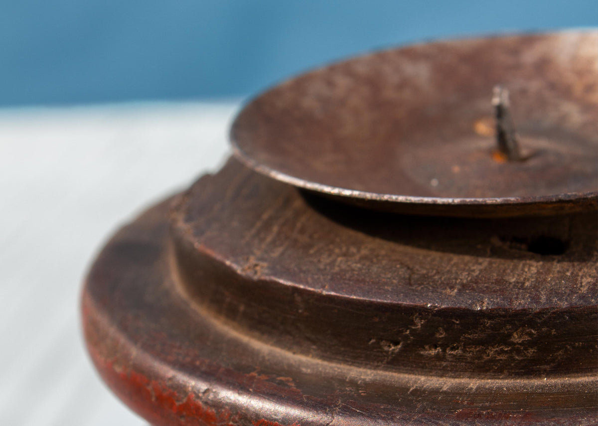 Close-up of the Wood Fire Candle Holders - Medium showing its metal candle cup.