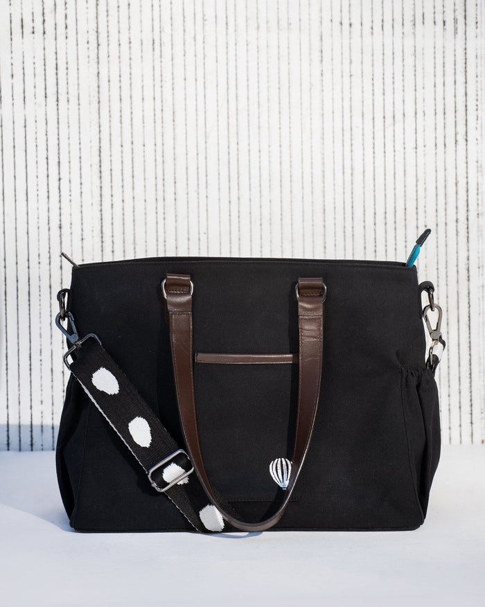 Black Perfect Work Bag with brown leather handles and a patterned shoulder strap.