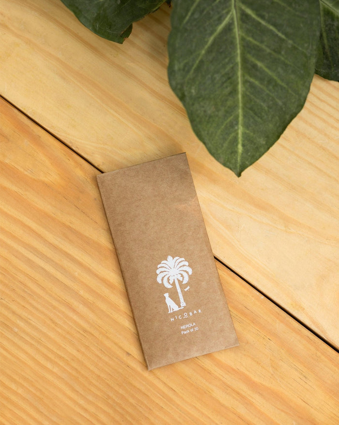 Nerola incense sticks in a brown kraft packet with a palm logo.