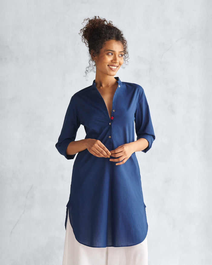 Person wearing a navy mid-length kurta with a mandarin collar.