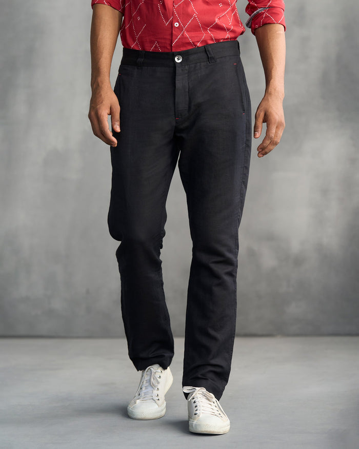 Person wearing black Comoros Trousers.