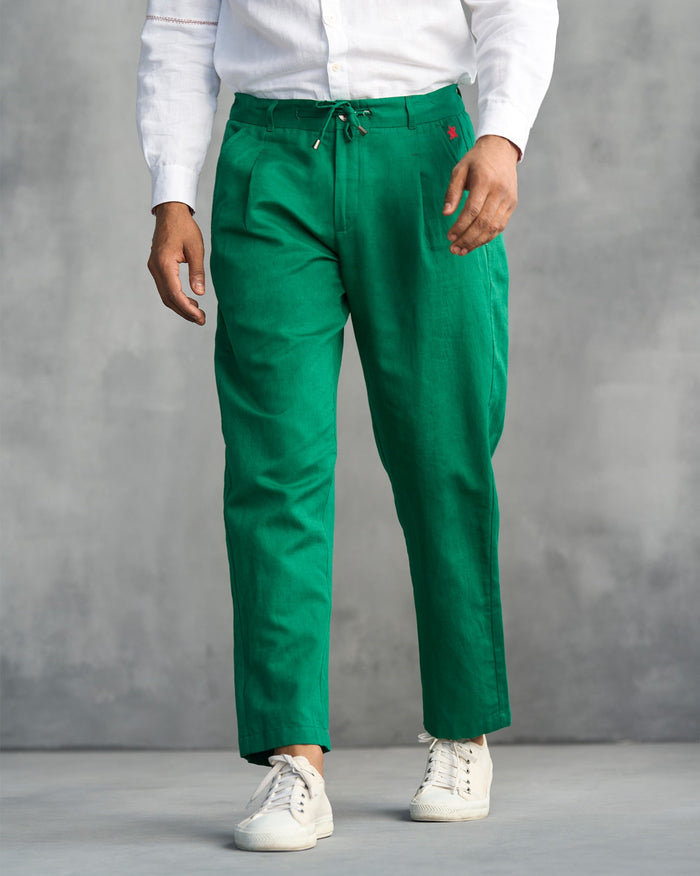Person wearing green Lounge Pants with a drawstring waist.