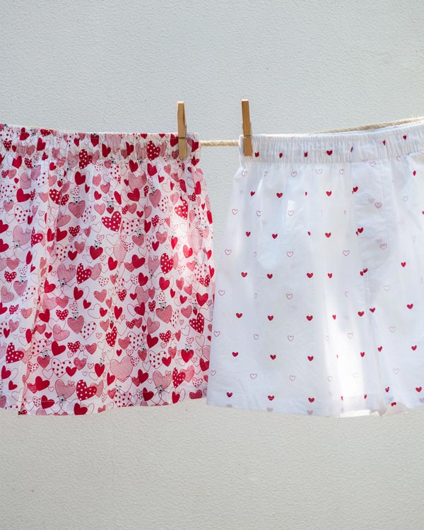 Close-up of the red heart print on the Big Hearts Puppies Boxers.