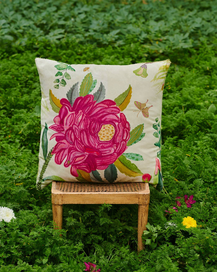 Gulbahar Cushion Cover with a large pink flower on a cream ground.