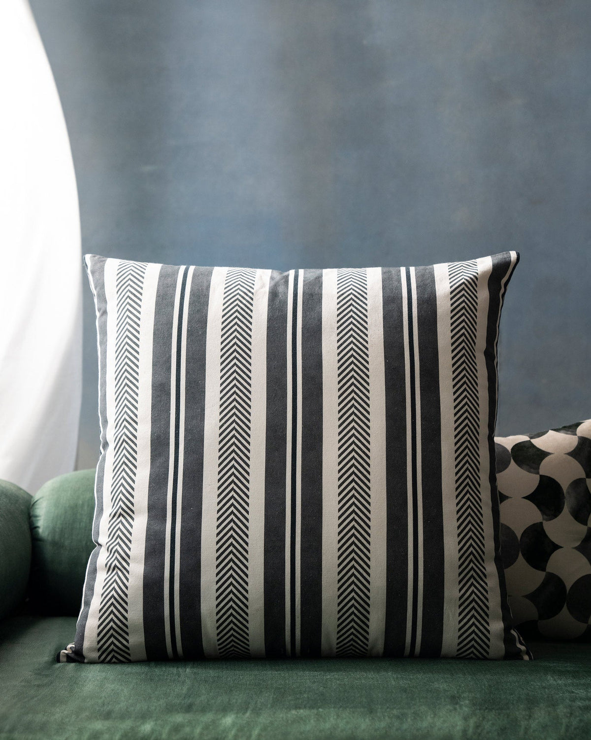 Lotus Euro Sham in cream with grey vertical stripes and herringbone trim.