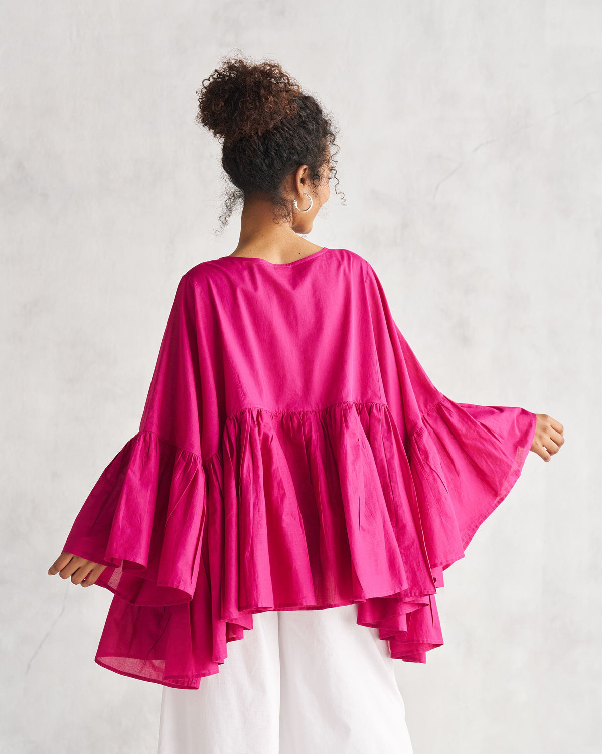 Back of a berry Frill Top worn by a person.