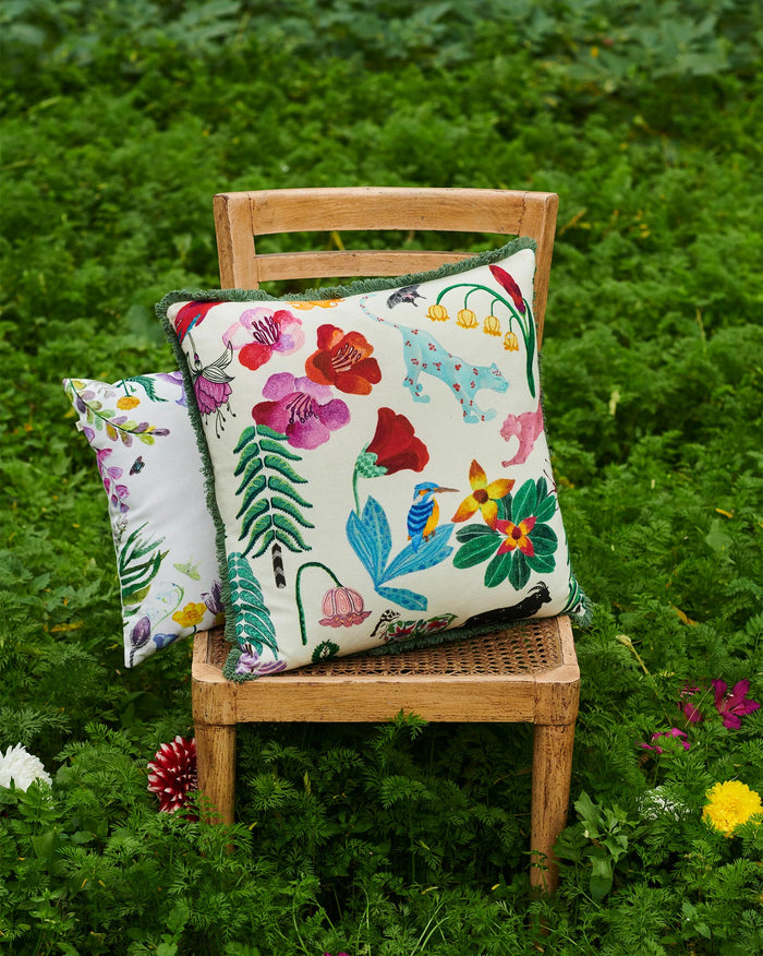 Spring in the Valley Cushion Cover with printed flowers and green fringe edging.